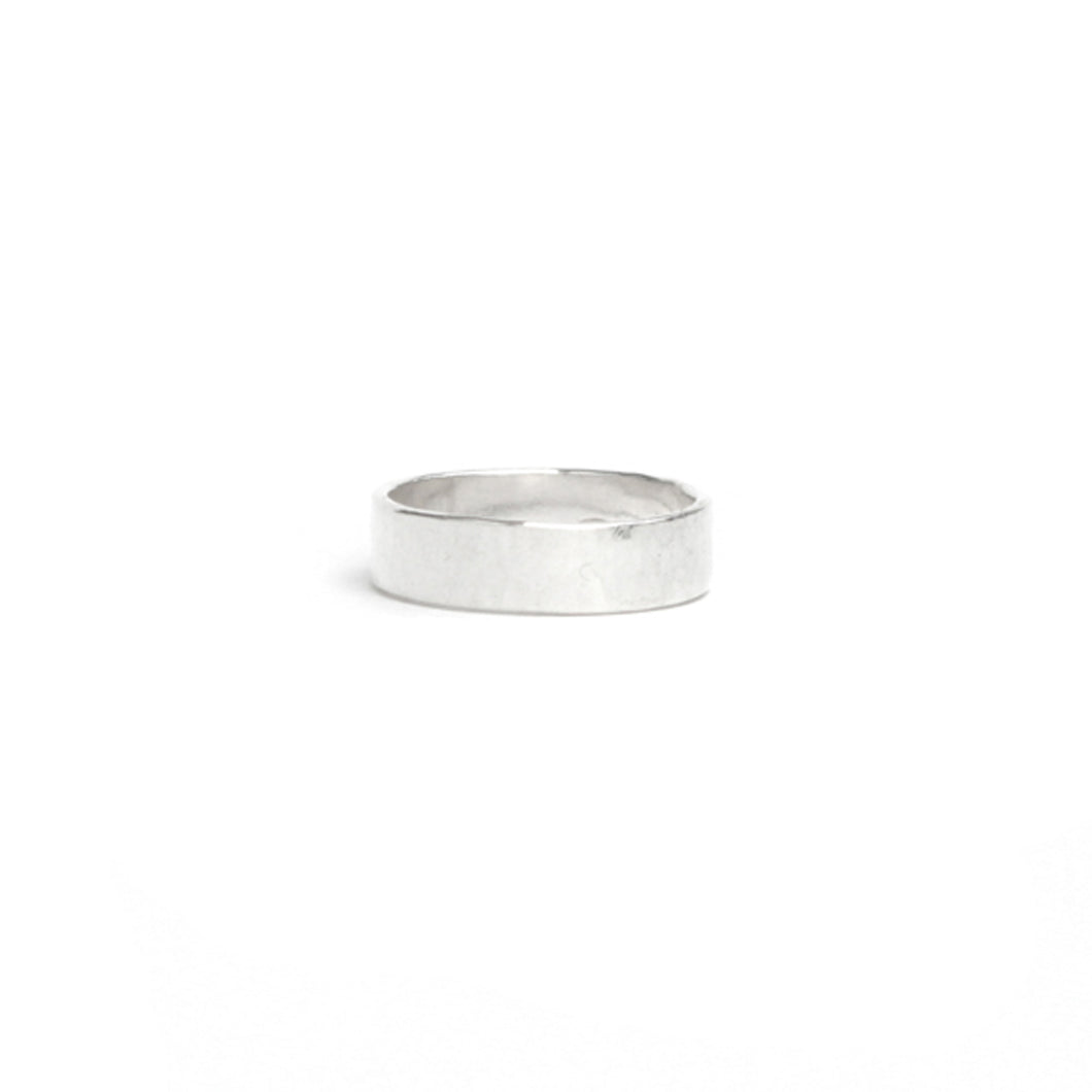 Medium wide hammered silver ring